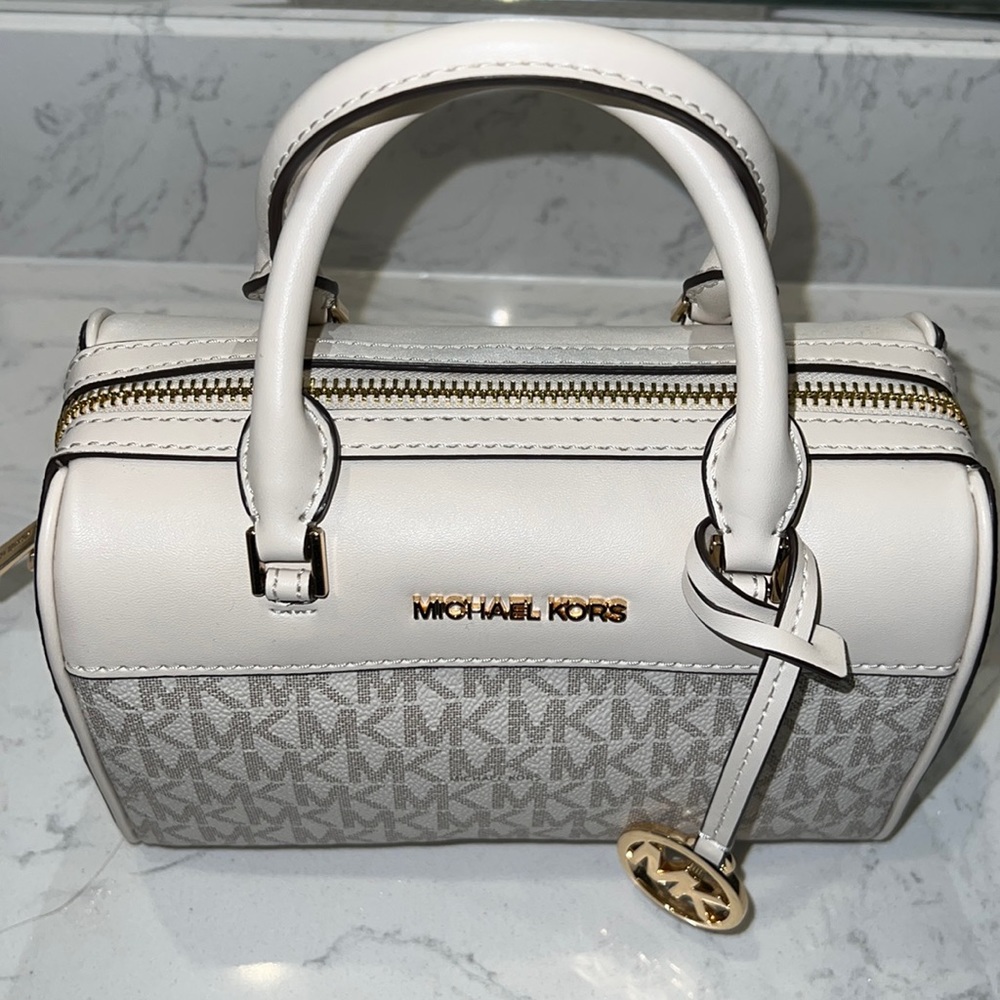Micheal Kors jet set travel small logo and faux leather duffle crossbody bag